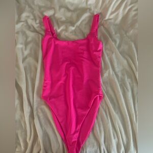 Hot pink bodysuit/swimsuit from Fashion Nova